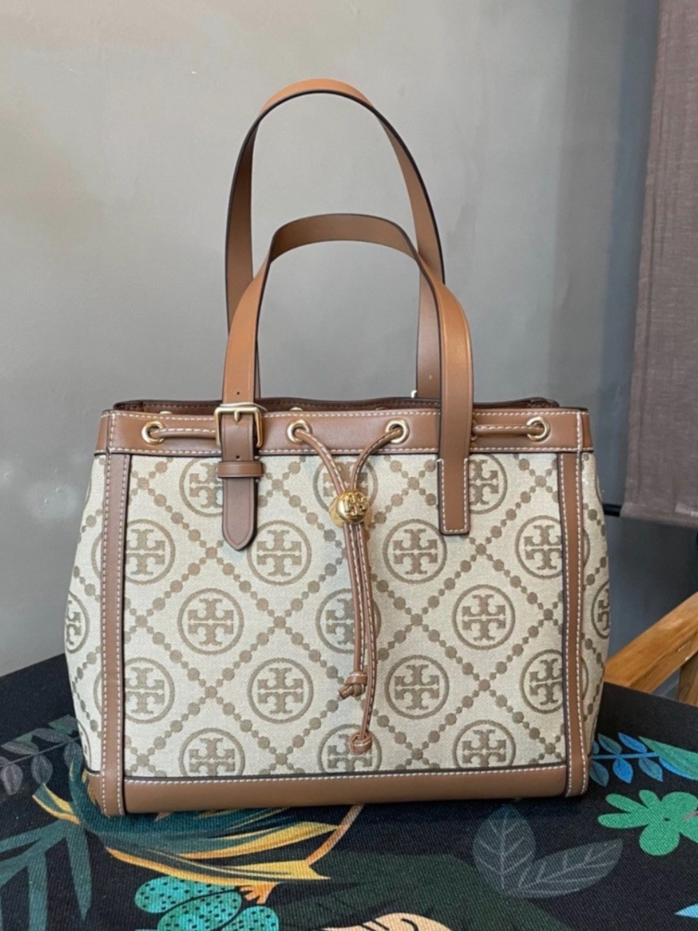 Tory Burch Beige and Brown Logo
Canvas Tote with Gold Charm